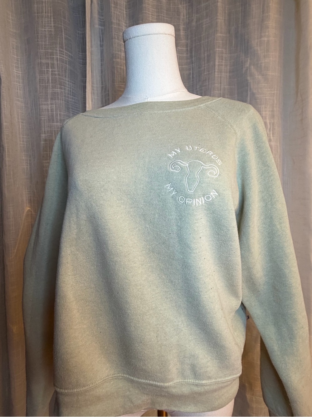 Sage Green Crewneck Sweater with 'My Uterus My Opinion' Embroidery